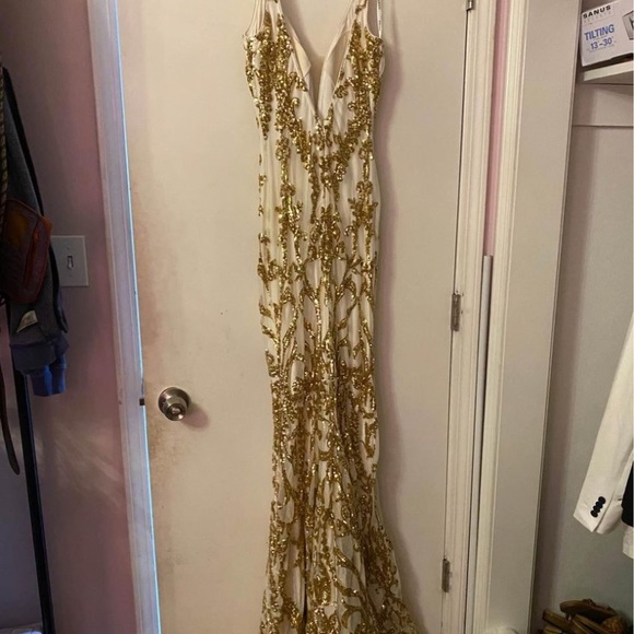 Two prom dresses never worn. Blue is size 4, gold is size 0. Still in bags - Picture 9 of 9